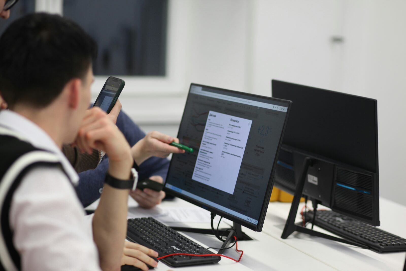 Analyst reviewing verification results on screen